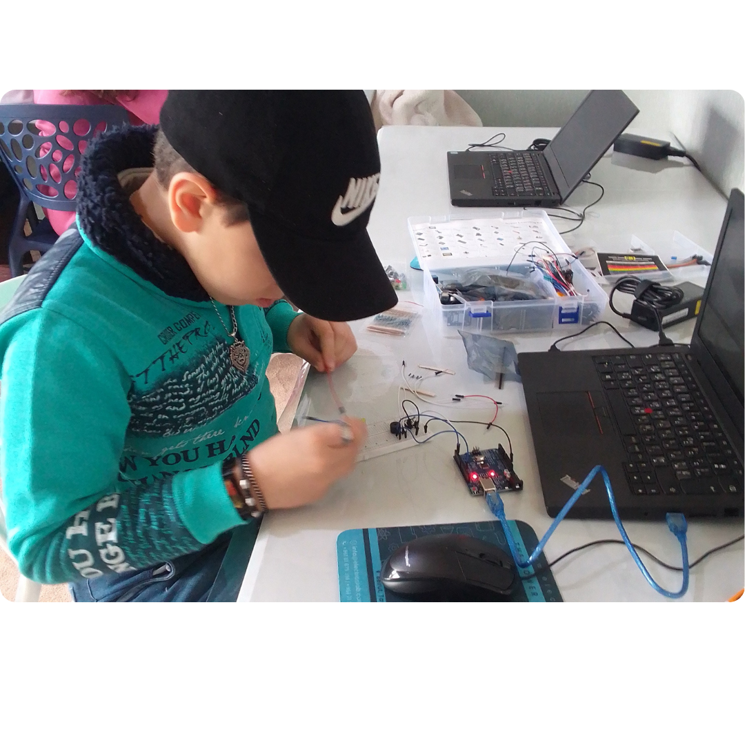 Student building an electronics project